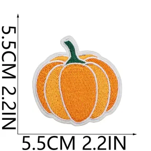 Detail showing dimensions of the orange pumpkin embroidery iron-on patch.