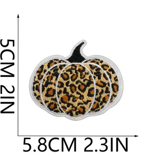 Detailed size view of leopard print pumpkin embroidery patch measuring 5.8cm by 5cm