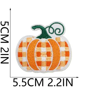 Detail view showing dimensions of the orange checkered pumpkin iron-on embroidery patch