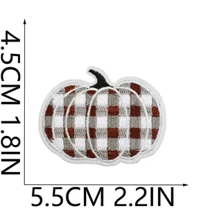 Embroidered pumpkin patch with plaid pattern, 2.2x1.8 inches dimensions detail view