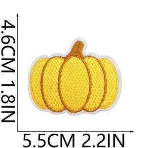 Detailed dimension diagram for yellow pumpkin embroidered iron-on patch with measurements