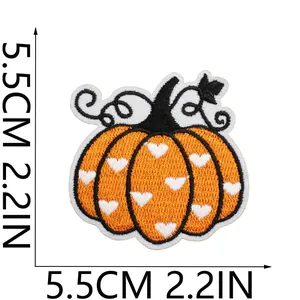 Macro view of pumpkin embroidery patch with heart pattern and 5.5cm size