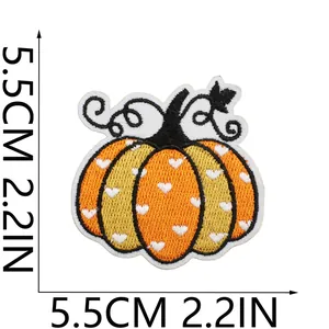 Macro detail showing the 5.5cm festive pumpkin embroidered iron-on patch measurements
