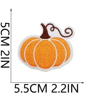 Decorative pumpkin embroidery patch detail showing dimensions 5.5cm by 5cm size