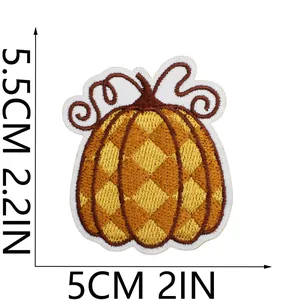 Detailed view of yellow diamond pumpkin embroidery patch showing 5.5x5cm size measurements.