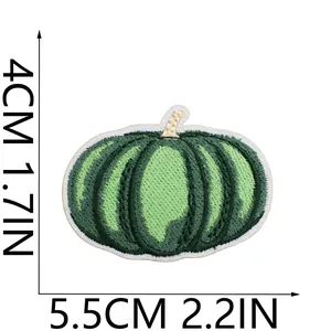 Detail view of green pumpkin embroidery patch with dimensions 4x5.5cm for holiday decor