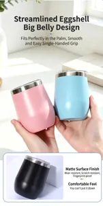 Close-up of matte finish on streamlined egg-shaped pink and blue stainless steel tumblers
