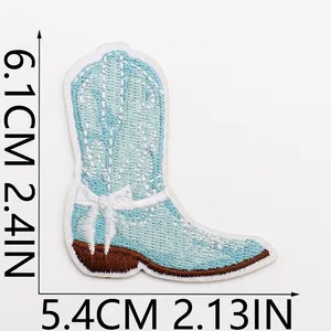 Close-up detail of light blue cowboy boot embroidered patch showing 2.4 x 2.13 inch size