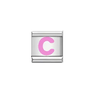 Close-up of Italian charm link with a pink letter C on stainless steel