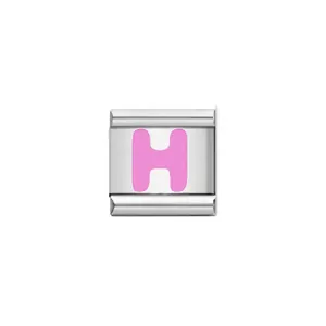 Detailed macro view of pink enamel letter H charm for Italian modular bracelet links