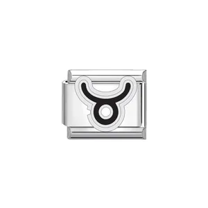 Close-up of stainless steel Italian charm link featuring a black Taurus zodiac symbol.