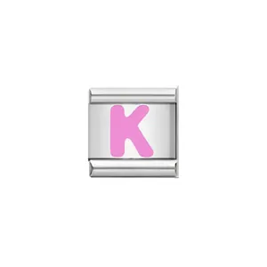 Detailed view of Italian charm link featuring a pink enamel letter K