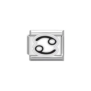 Detailed macro view of a stainless steel Italian charm link with Cancer zodiac symbol