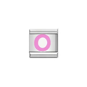 Detailed macro view of Italian charm module with pink letter O on stainless steel
