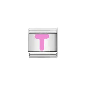 Detailed view of a stainless steel Italian charm bracelet link with a pink letter T