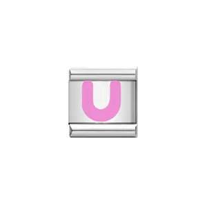 Detailed view of Italian charm link featuring a vibrant pink letter U on silver base
