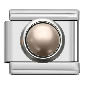 Detailed macro view of a silver Italian charm link with a champagne pearl center piece.