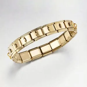 Close-up shot of Italian style gold modular charm bracelet links with side connection hooks.
