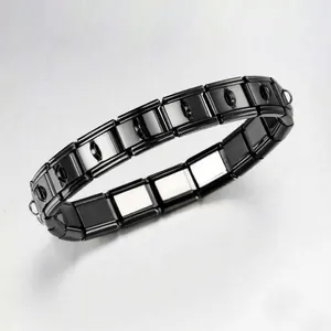 Close-up detail of glossy black Italian-style modular stainless steel bracelet links