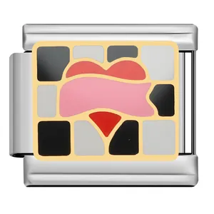 Macro detail of red heart and mosaic pattern enamel charm link for DIY modular jewelry