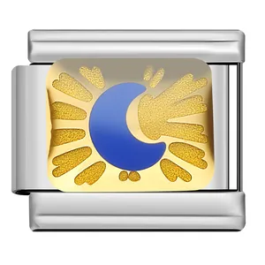 Detail macro view of a silver modular Italian charm link with gold sun and blue moon design.