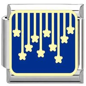 Macro detail of a starry sky Italian link charm with blue enamel and yellow stars.