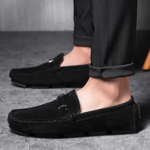 Classic black suede men's loafers with metal buckle and comfortable driving sole