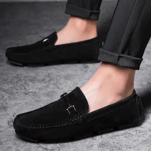 Men's black suede loafers with metal bit detail, comfortable driving shoes for daily wear.