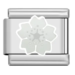 Close-up of a silver Italian charm link with a white sakura flower design