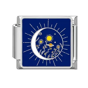 Detail of Italian modular charm with celestial night sky moon and sun enamel design