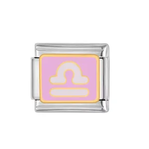 Close-up detail of stainless steel Libra zodiac modular charm with pink enamel background