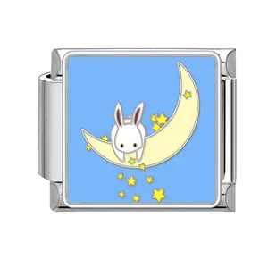 Detail view of Italian charm link featuring a rabbit on a crescent moon with stars.