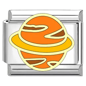 Close-up of Saturn planet enamel design on a modular Italian charm for DIY bracelets
