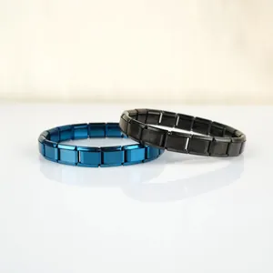 Detailed macro shot of blue and black modular stainless steel Italian charm bracelets