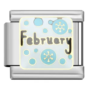 Close-up view of a February themed modular charm link with blue snowflake patterns