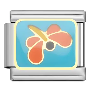 Detailed view of stainless steel charm link featuring a colorful enameled dragonfly design