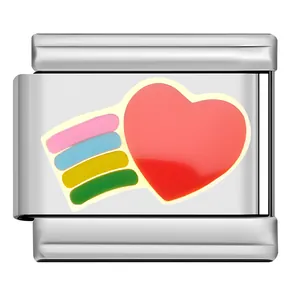 Close-up of Italian modular charm link with red heart and colorful rainbow enamel detail