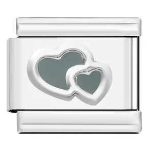 Close-up of stainless steel Italian charm link featuring embossed double heart design