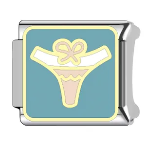 Close-up of Italian charm bracelet link with cute blue bikini and bow design