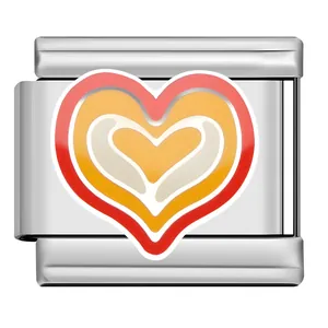 Macro view of a colorful multi-layered heart charm link for Italian modular bracelets