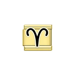 Detailed macro view of a gold Aries zodiac symbol Italian charm for modular bracelets.