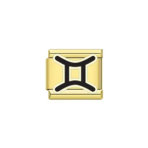 Macro detail of gold Italian charm link with black Gemini zodiac symbol. 88 chars