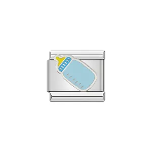 Macro detail of a high-quality stainless steel Italian charm link featuring a blue baby bottle