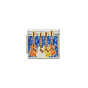 Detailed close-up of an Italian charm link with colorful guitar patterns on blue glitter