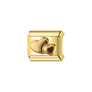 Close-up detail of gold-plated stainless steel Italian charm link featuring double heart motif