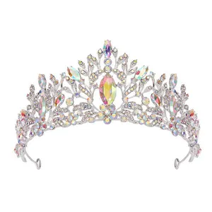 Detailed view of silver bridal tiara crown with iridescent AB crystals for weddings