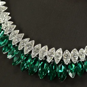 Luxury bridal necklace featuring marquise-cut emerald green and clear zircon stones.