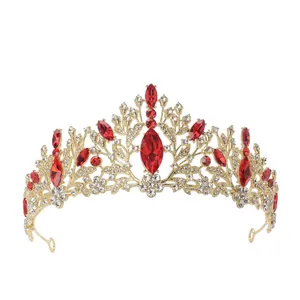 Elegant gold bridal tiara crown with marquise red gems and sparkling white rhinestones
