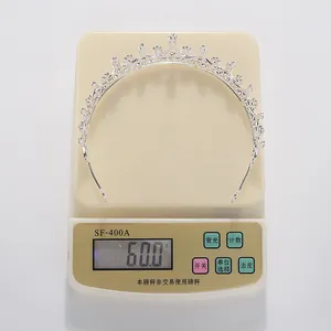 Detailed shot showing the 60.0g weight of the elegant silver bridal tiara crown