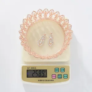 Detail view showing the 258.9g weight of the rose gold baroque bridal crown set